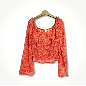 Gianni Bini red and white circle detail long sleeve form fitting medium peplum